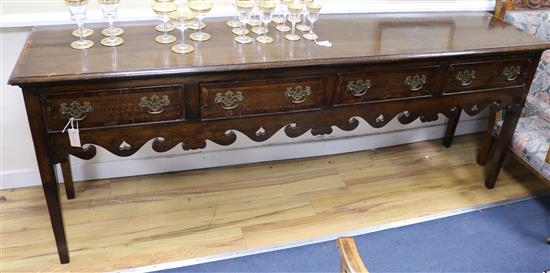 An 18th century style oak dresser base w.216cm